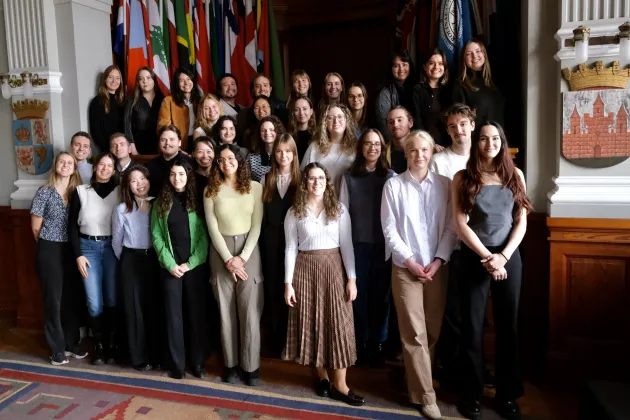 A group of students in a university aula