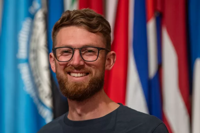  Person in front of flags